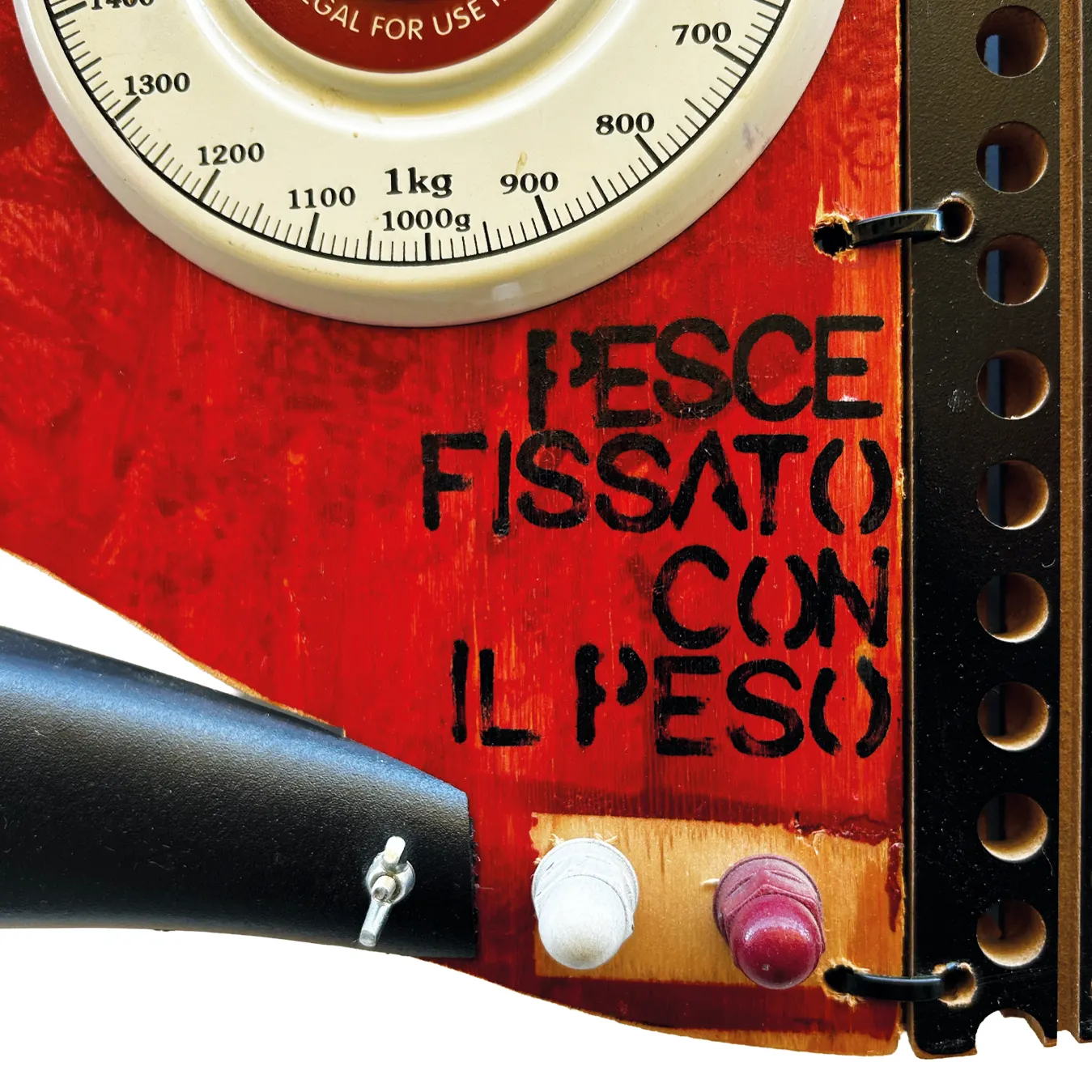 Dettaglio del titolo PESCE FISSATO CON IL PESO
